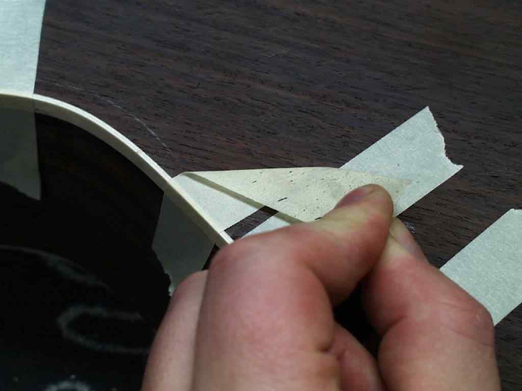 Ablösen des Klebestreifens