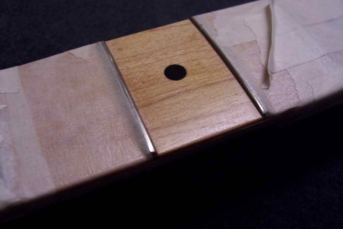 Segment-Lackierung an Fender Stratocaster Ahorn-Griffbrett