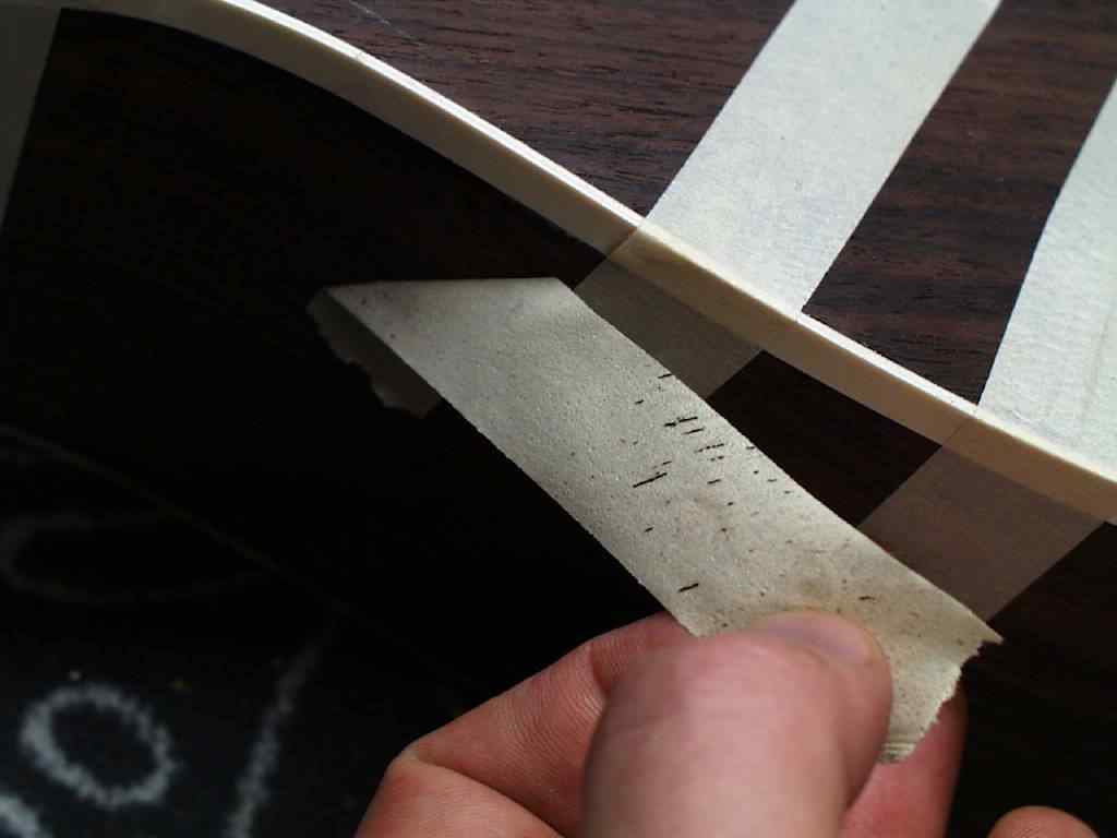 Ablösen des Klebestreifens